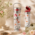 Thermos Leeza Mira Papothé avec motif floral, bouchon inox et ouverture rouge dans une ambiance douce et végétale